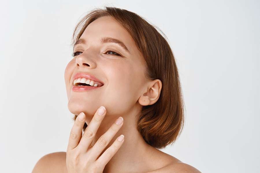 woman posing face lift botox treatment