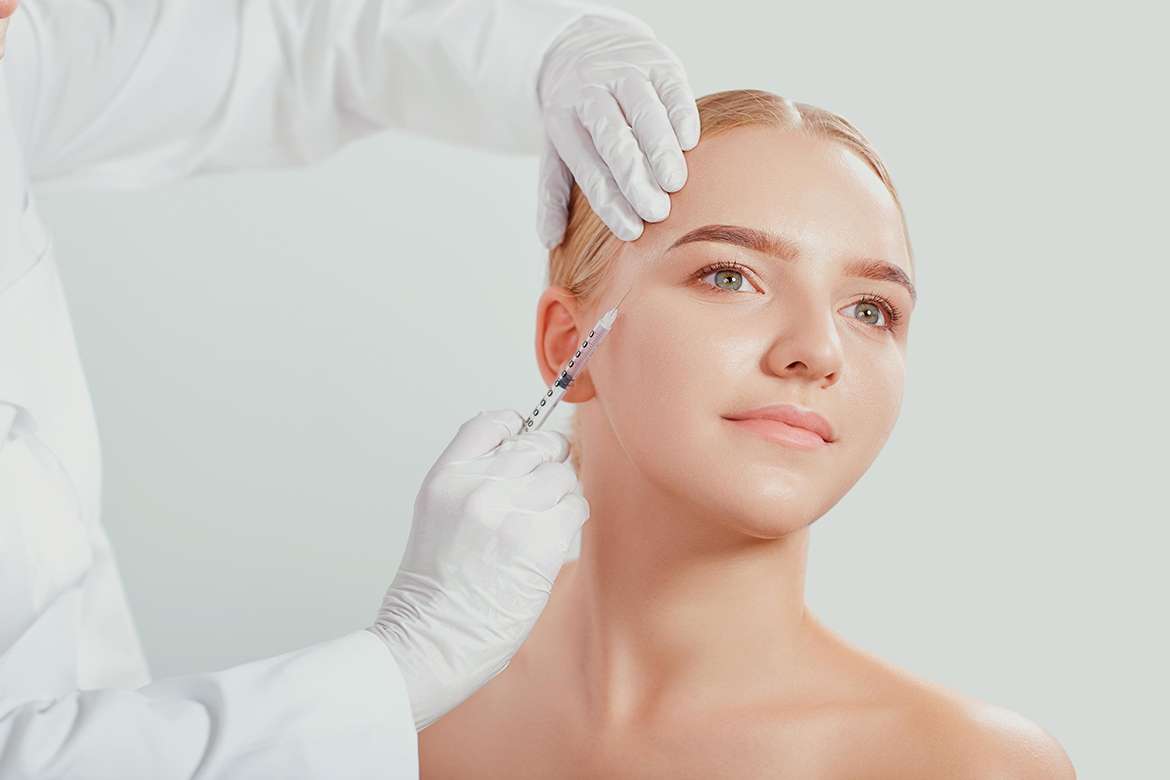 blond woman having botox cyprus treatment